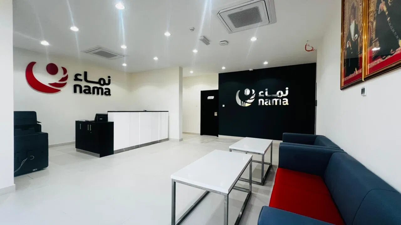 Nama interior office branding with 3D logo lettering on a reception wall